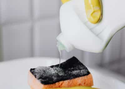 cleaning 13 pouring cleaner sponge